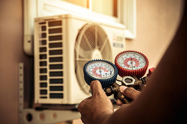 Professional Heat Pump Repair technician working in White Bluff, TN